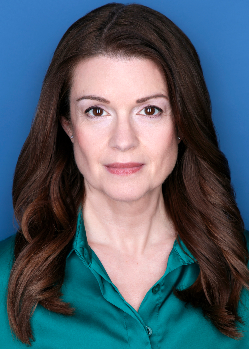 Amy Rose Traynor's "professional/lawyer look" headshot.
