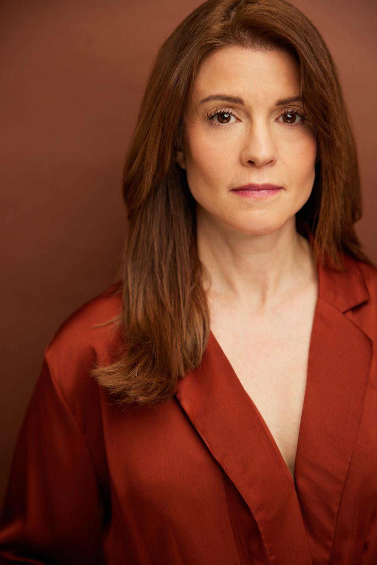 Amy Rose Traynor's "therapist/teacher look" headshot.